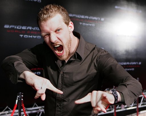 German singer Tobias Regner strikes a Spider-Man pose upon his arrival at the World Premiere of Spider-Man 3 in Tokyo.