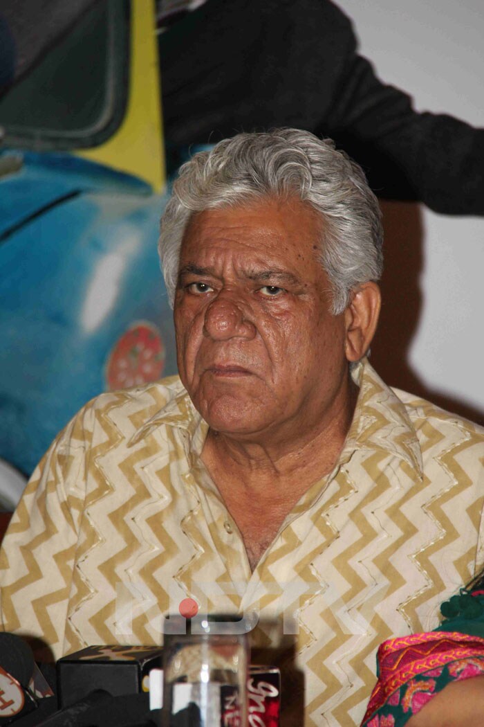 Om Puri talks to the press.