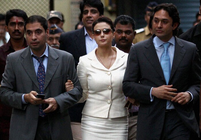 Co-owner of IPL's Kings XI Punjab Preity Zinta Ness Wadia (R) and Mohit Burman (L) coming out of the High Court after a hearing on their petition challenging termination of IPL contract by BCCI.