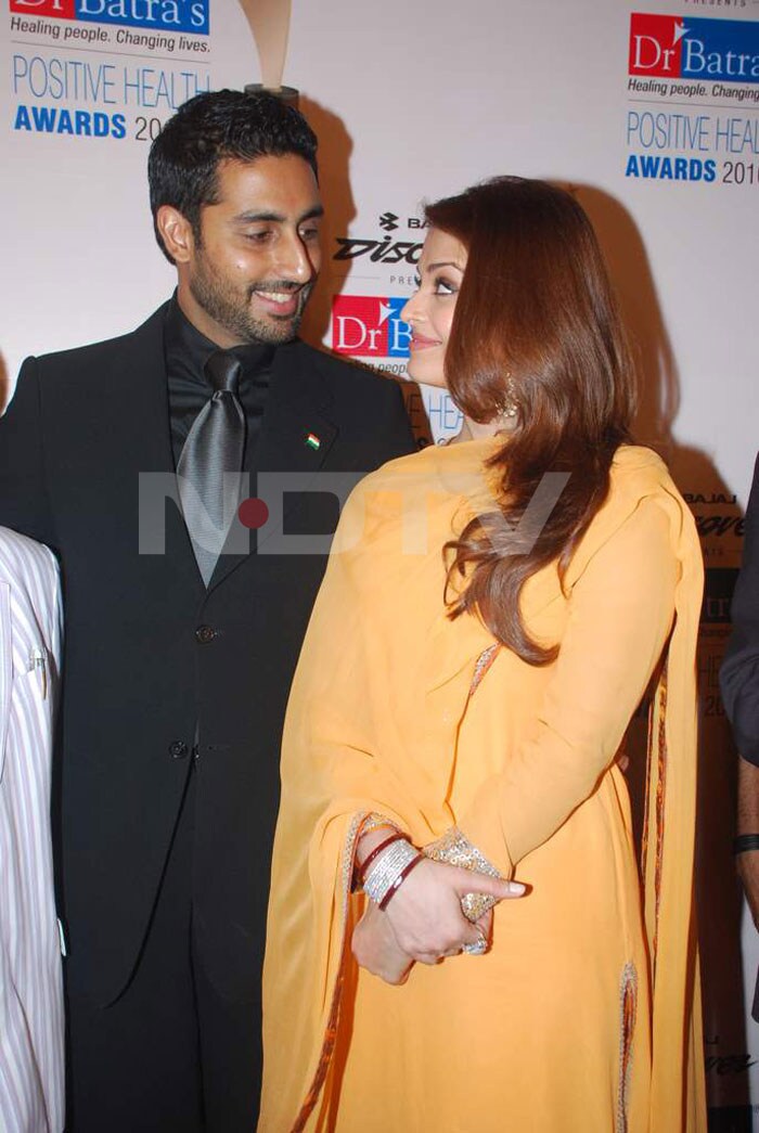 Seeing eye-to-eye: Abhishek and Aishwarya steal a glance.