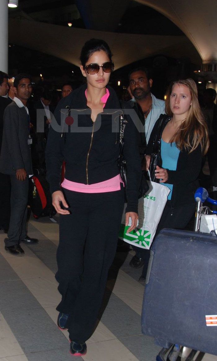 We spotted Katrina trying to fly under the radar at Mumbai airport. She just returned from an ad shoot in Bangkok.