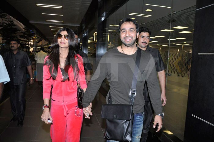 And it must have been some trip as La Shilpa and her husband of a year just can't stop smiling.