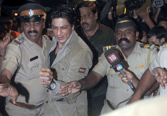 On reports in Sena mouthpiece 'Saamana' that Shah Rukh was stopped by Congress from meeting Sena chief Bal Thackeray to settle the issue, Chavan said it not true. (Photo: AFP)