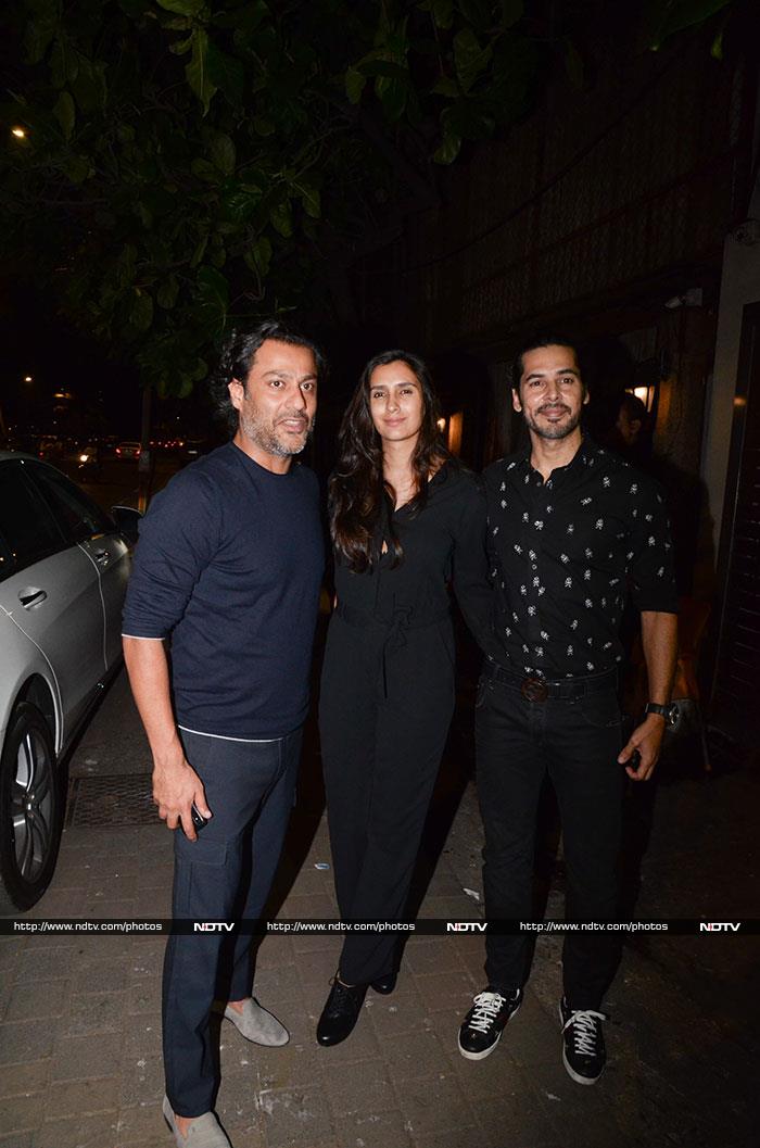 Abhishek Kapoor's plus one was wife Pragya. They posed for the shutterbugs with Dino Morea.