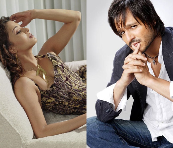 <B>Vivek Oberoi and Aishwarya Rai</B> ? Why don't they come together in a movie? Your guess is as good as ours.