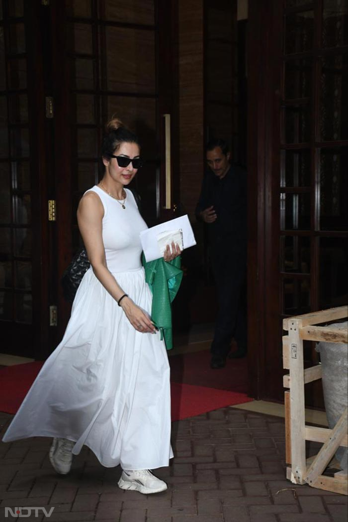 Malaika Arora clicked in a classic white ensemble. (Image courtesy: Varinder Chawla)