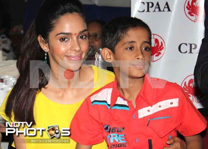 Mallika makes time for some special children