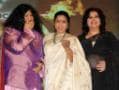 Photo : Asha Bhosle, bitten by the reality bug?