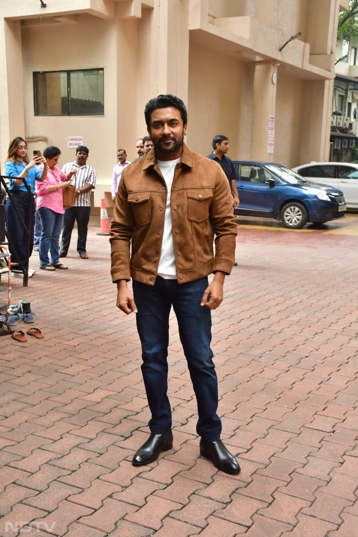 Suriya looked dapper in a jacket and denims. (Image Courtesy: Varinder Chawla)