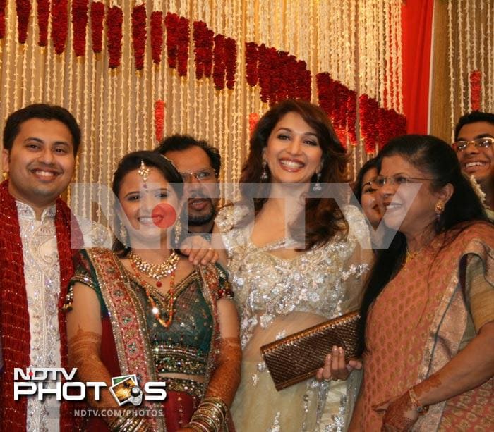 Madhuri, Dilip Kumar at society wedding