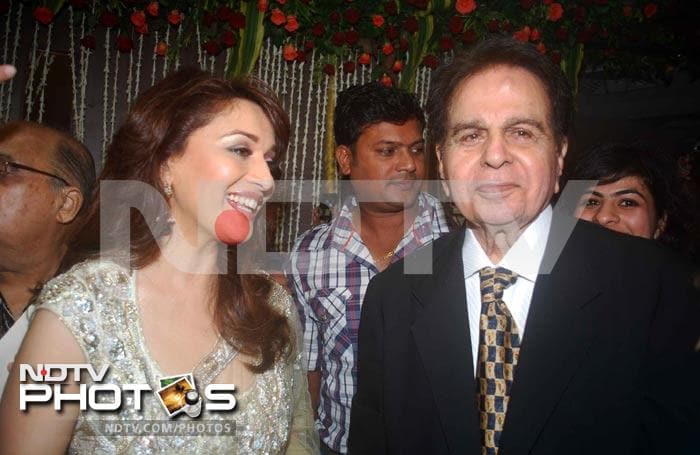 Madhuri, Dilip Kumar at society wedding