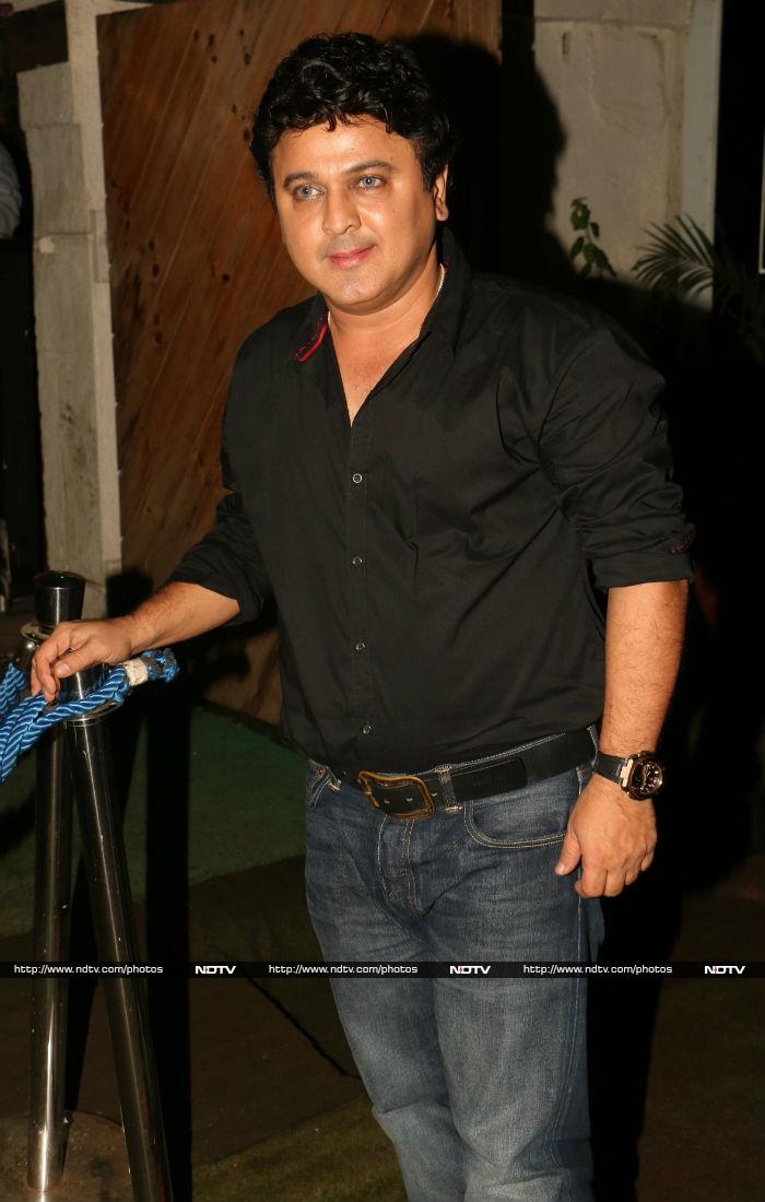 Ali Asgar smiled at the cameras while he was photographed in Bandra.