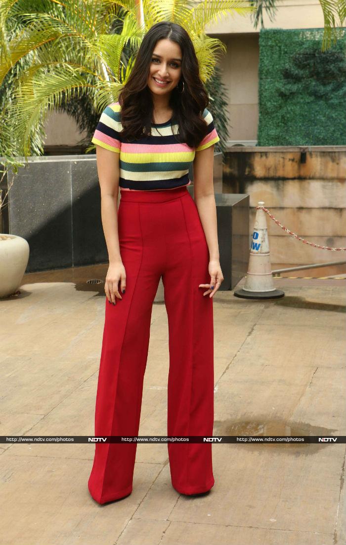 Shraddha Kapoor looked absolutely stunning in red bell bottom pants paired with a striped crop top while she promoted her upcoming <i>Haseena Parkar</i>.