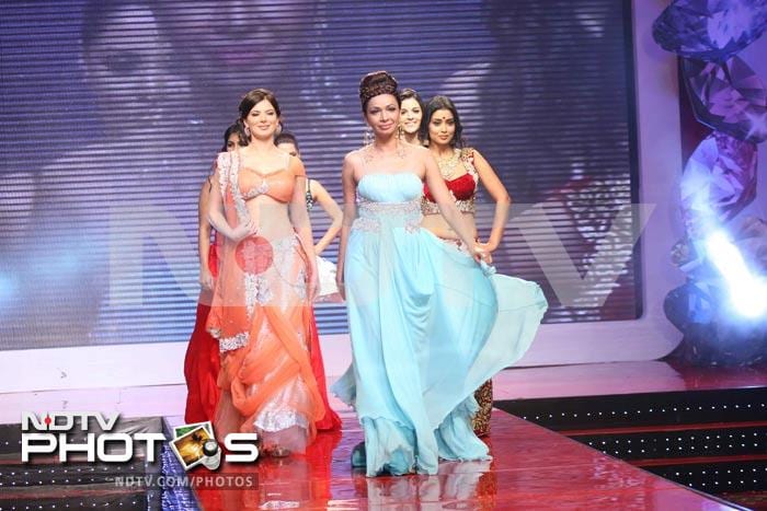 Achla Sachdev, who directed and choreographed the fashion show looked cool in a blue gown.