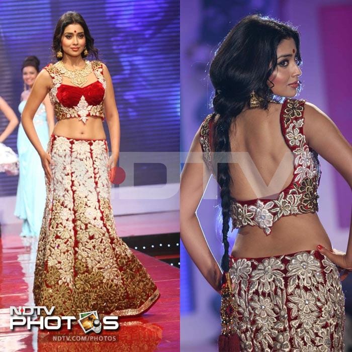 The actress, who had her first commercial success with the Telugu film <i>Santhosham</i> (2002), walked the ramp in a heavily embroidered maroon <i>lehenga</i>.