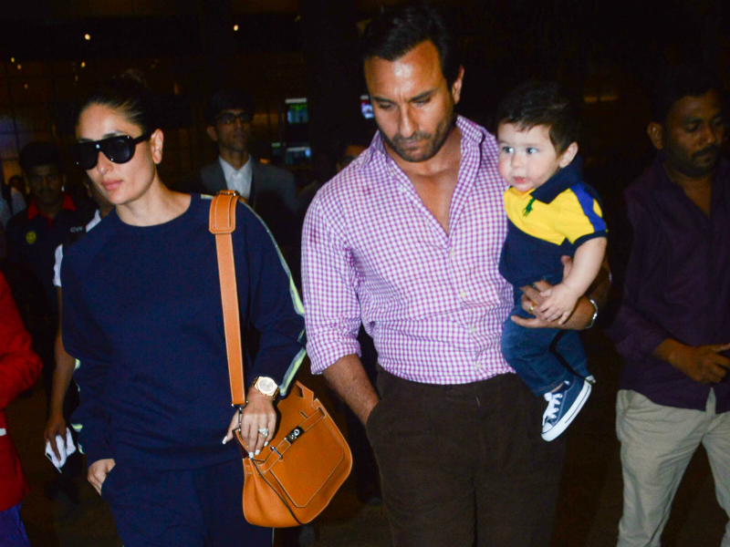 Taimur, Kareena, Saif Touch Down In Mumbai