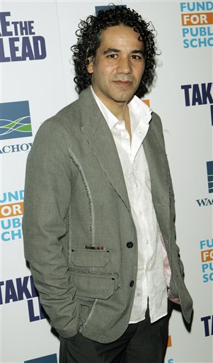 John Ortiz, who plays the role of Mr Temple, poses for photographers during arrivals for the world premiere of the film Take the Lead.