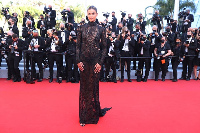 American model Taylor Hill looked stunning in a black lacy gown as she arrived for the screening of the film  De Son Vivant(Peaceful) on the 4th day of the 74th Cannes Film Festival.