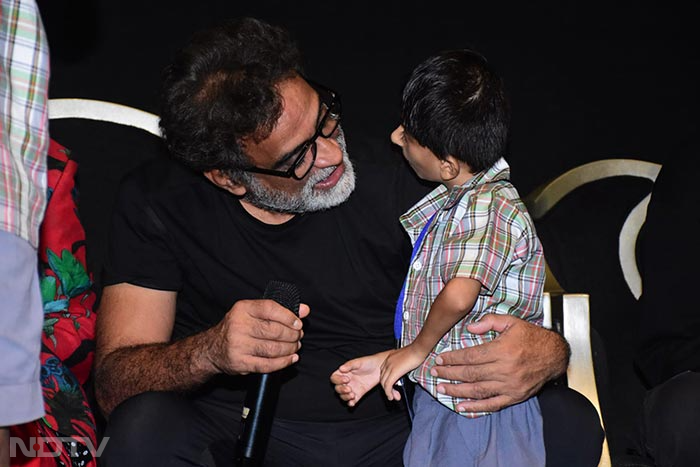 Director R Balki was captured at his candid best with a child. (Image Courtesy: Varinder Chawla)