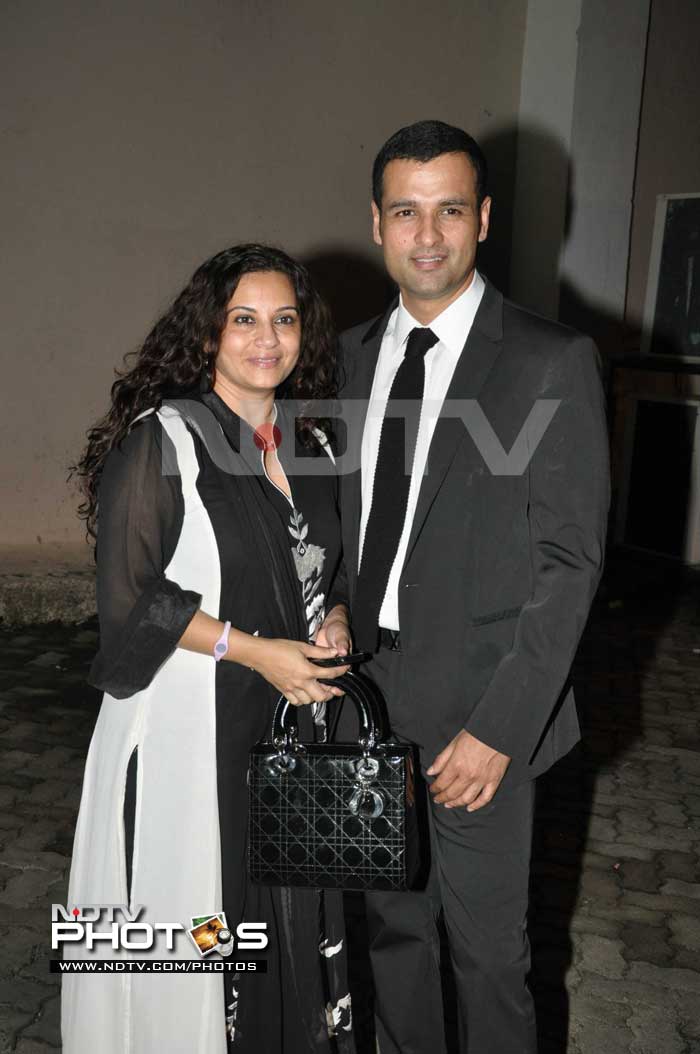 Rohit Roy with his Lady Dior carrying <i>biwi</i> Manasi.