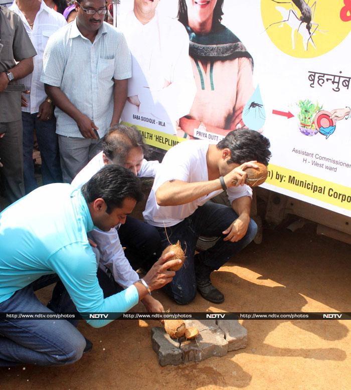 The trio commemorated the awareness drive by breaking coconuts.