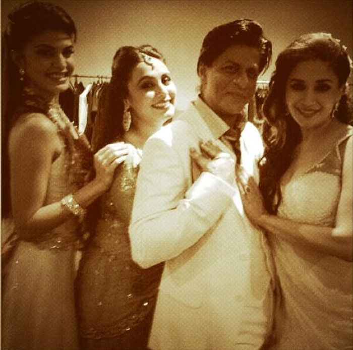 We stumbled upon this picture of Bollywood actor Shah Rukh Khan with actresses Madhuri Dixit, Rani Mukherji and Jacqueline Fernandez backstage at the <i>Temptation Reloaded</i> concert in Sydney. SRK seems to be really thrilled in the company of the beautiful stars who also look really happy to be posing with him. <br><br>
Madhuri Dixit, who posted this picture on Twitter also wrote: Backstage last night in Sydney! Had a great time! Temptation Reloaded.<BR><BR>

This image was posted on Twitter by <a href="https://twitter.com/MadhuriDixit" class="fn fl fa fs12">@MadhuriDixit</a><br><br>

Coming up: Shah Rukh's Auckland Express