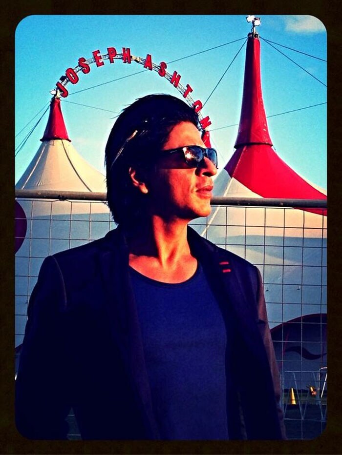 We stumbled upon this picture of Bollywood superstar Shah Rukh Khan standing in front of Circus Joseph Ashton in Australia. The actor appeared in Aziz Mirza's <I>Circus</I> in 1989, a television show which earned him popularity and recognition. The actor commented on his picture: ?Saw a Big Top after years on way to show. Memories of my Circus days suddenly. <I>Ho Gaya toh kartab..mar gaye to Hadsaa</I>.? <br><br> This image was posted on Twitter by 

<a href=" https://twitter.com/iamsrk/status/387880747329400832/photo/1" class="fn fl fa fs12"> @iamsrk</a><br><br>Coming up: SRK and his Teen Deviyan