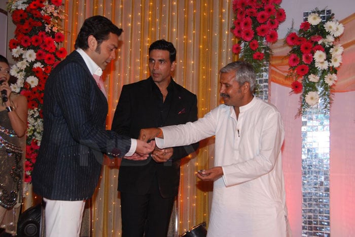 Akshay Kumar and Bobby Deol seek blessings for the success of their
new film.