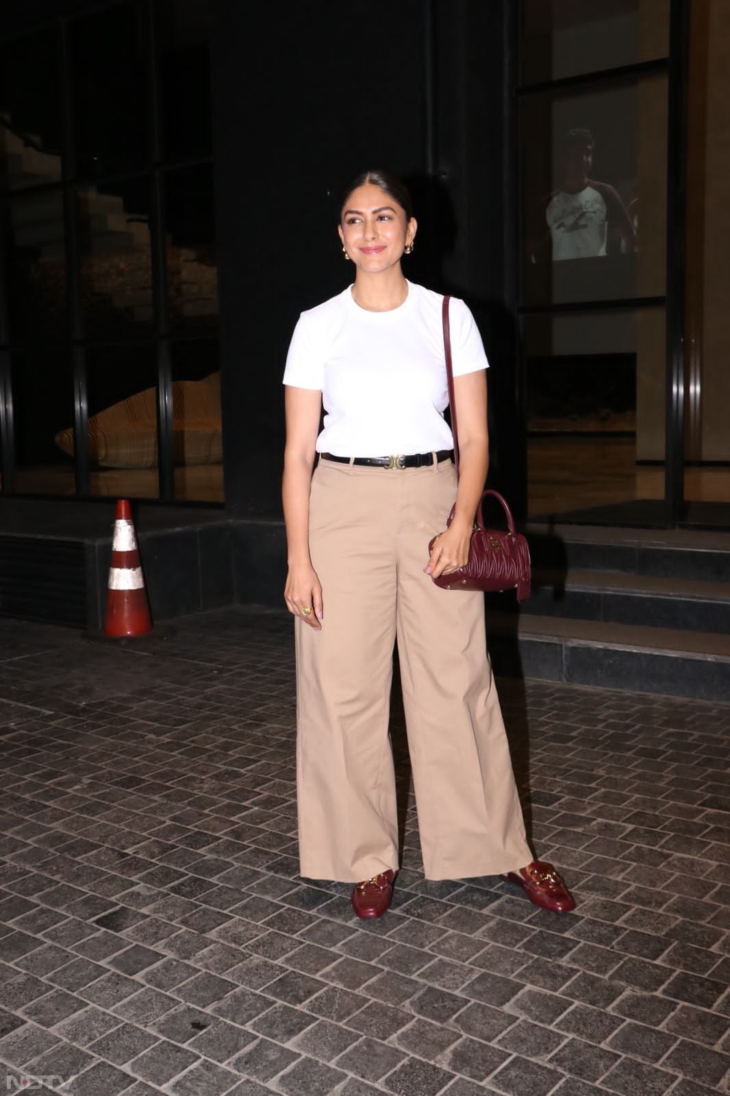 Mrunal Thakur looked chic in a white top and pants. (Image Courtesy: Varinder Chawla)