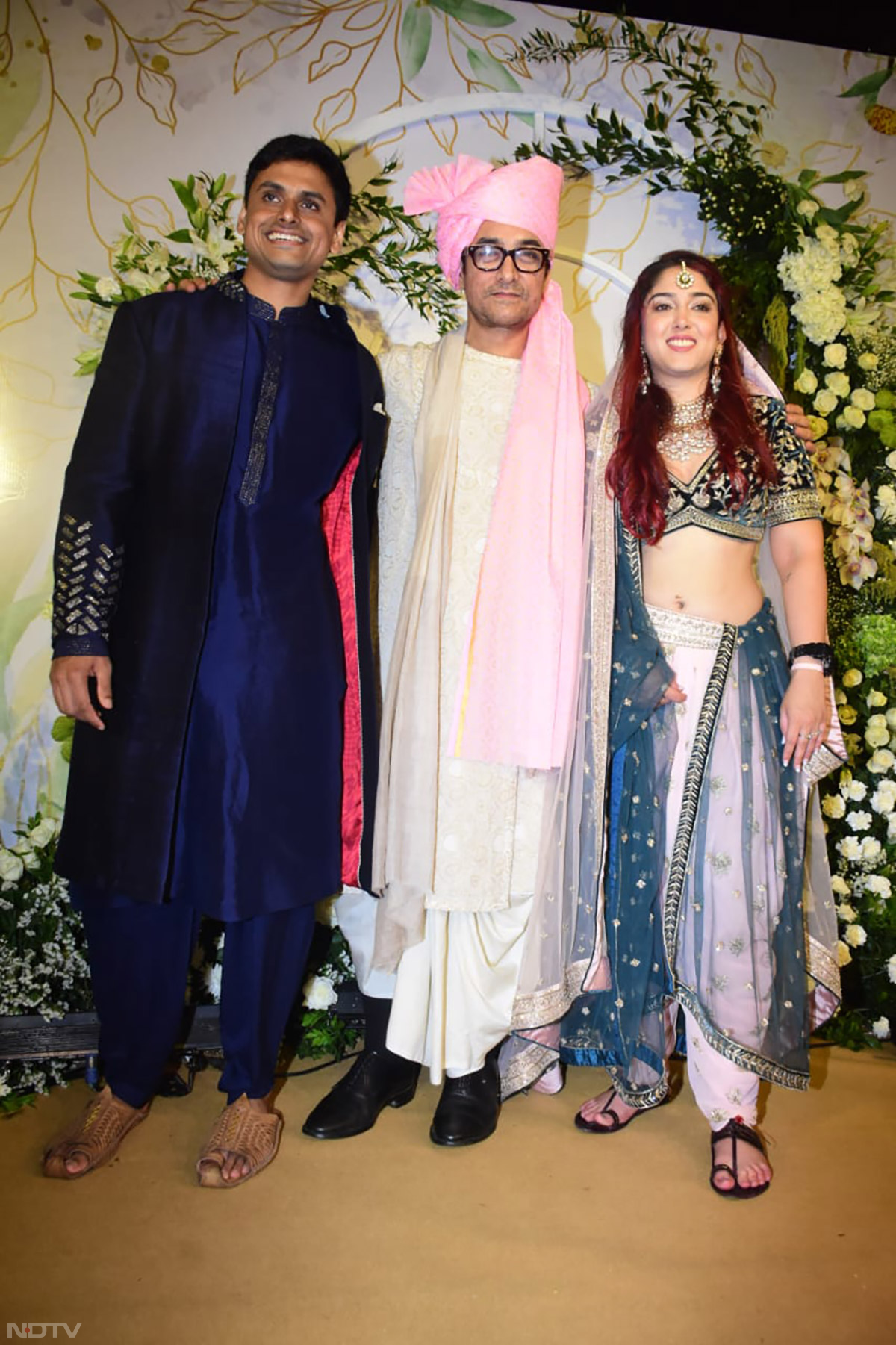 Aamir Khan posed with newlyweds Ira Khan and Nupur Shikhare. (Image courtesy: Varinder Chawla)