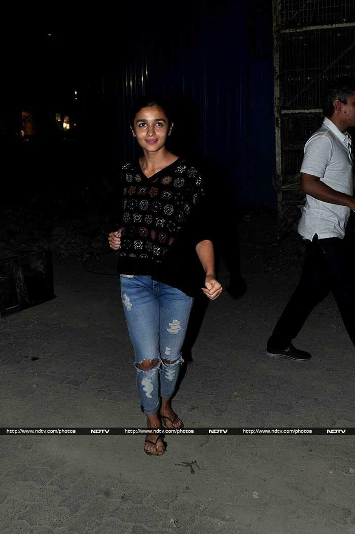 Actress Alia Bhatt was spotted at a studio in Mumbai on March 27. Dressed in a black top and a pair of distressed denims, the actress struck a pose for the paparazzi.