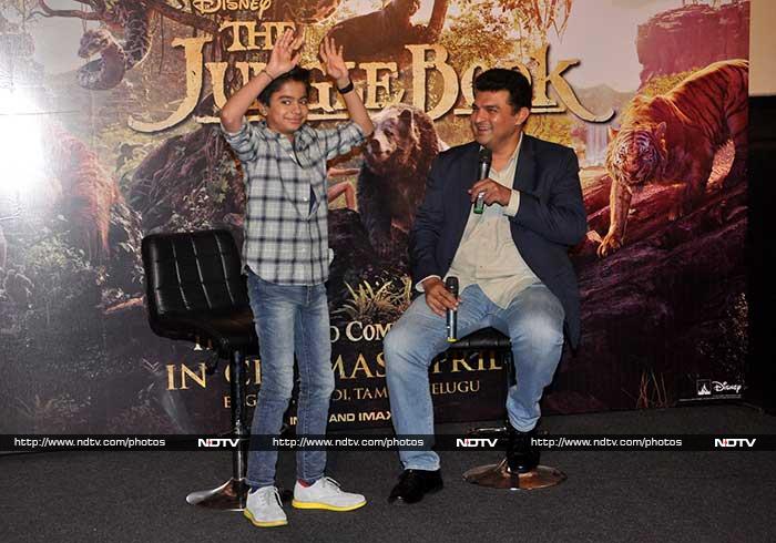 At another part of Mumbai, child artist Neel Sethi, who will star as Mowgli in upcoming movie <I>The Jungle Book</i>, attended a promotional event with producer, UTV's Siddharth Roy Kapur.