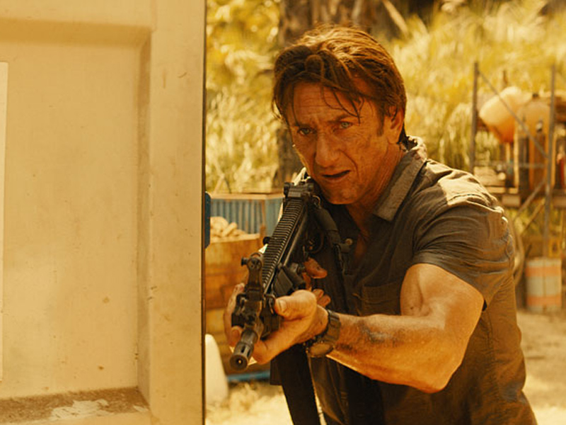 Sean Penn in Action in <i>The Gunman</i>