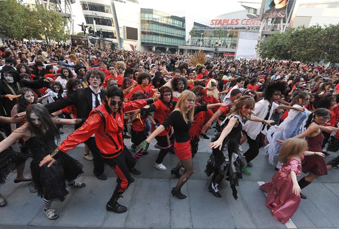 Thousands of participants perform Michael Jackson's &quot;Thriller&quot; zombie dance in front of the Staples Center in Los Angeles on October 24, 2009 as part of Thrill the World, a global simultaneous dance of the famous zombie dance. (Image: AFP)