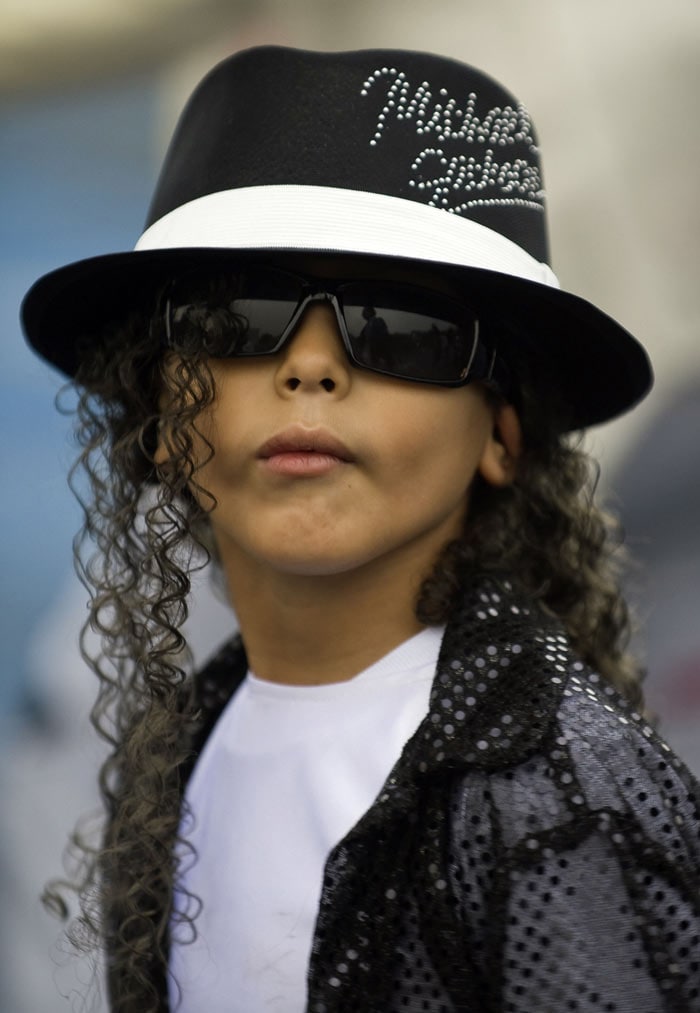 A Mexican boy impersonating the late US pop star Michael Jackson gestures during a rehearsal, just before the start of the &quot;Thrill The World: A Global Tribute to Michael Jackson&quot; in Mexico City. (Image: AFP)