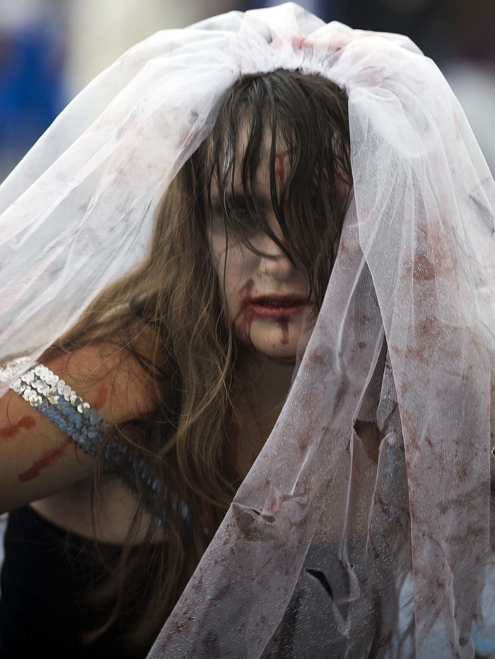 A Mexican teen made up as a zombie performs during the &quot;Thrill The World: A Global Tribute to Michael Jackson&quot; in Mexico City. (Image: AFP)