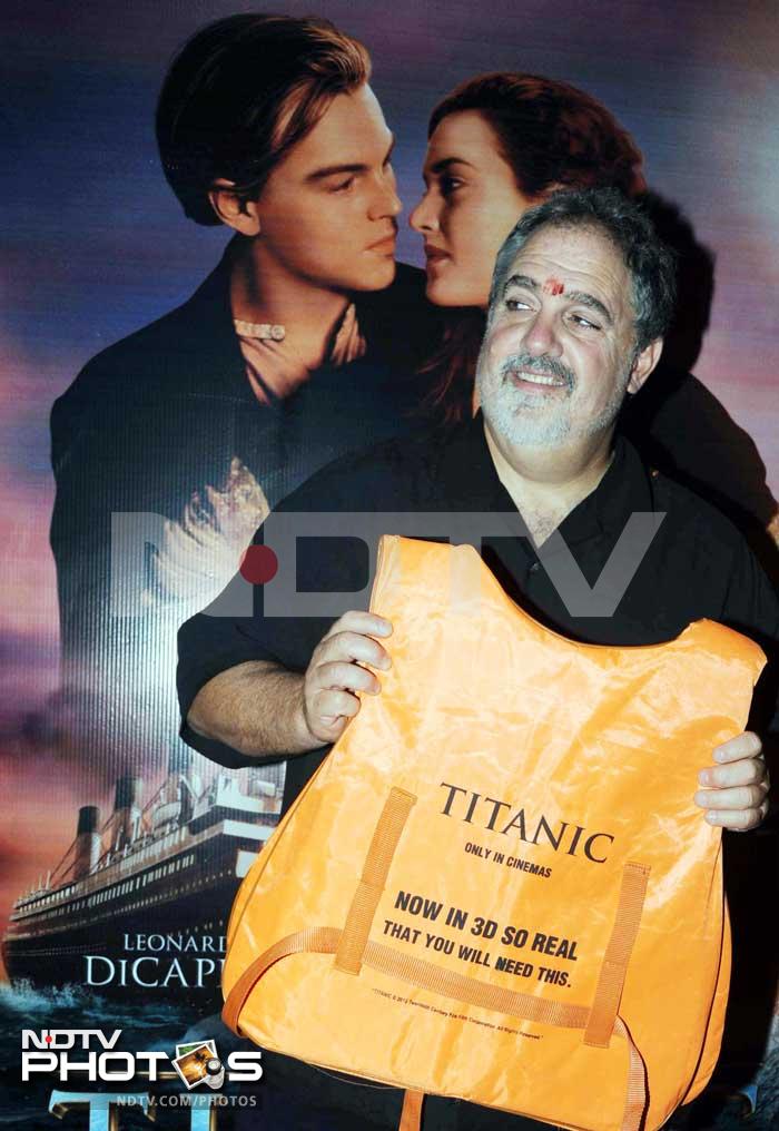 John poses with <i>Titanic's</i> lifejacket.