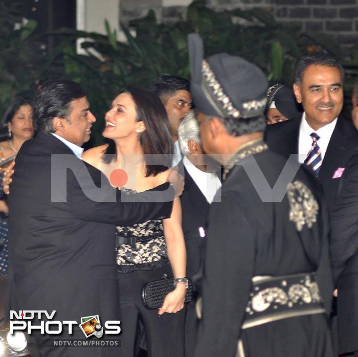 Preity gets a hug from Mukesh Ambani.