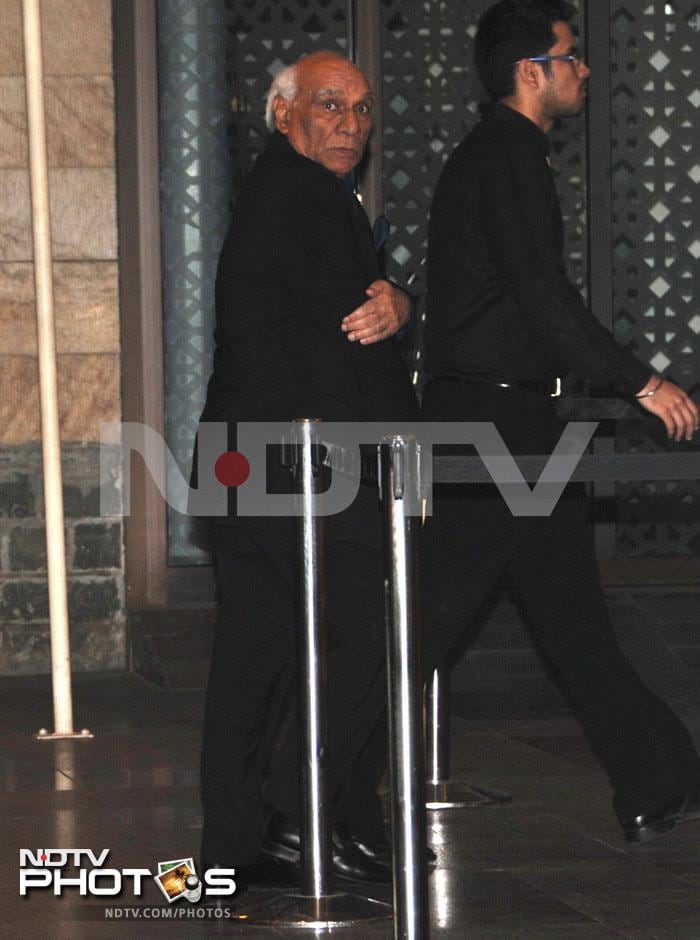 Producer-director Yash Chopra waits for his turn to get in.