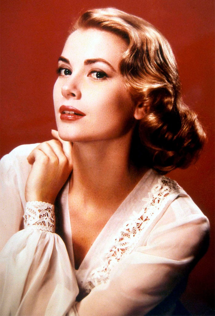 <B>Grace Kelly: </B> Not far behind, at the second position, is Grace Kelly . More commonly referred to as Princess Grace,she has always been known for her perfect blond hair and bold demeanour.