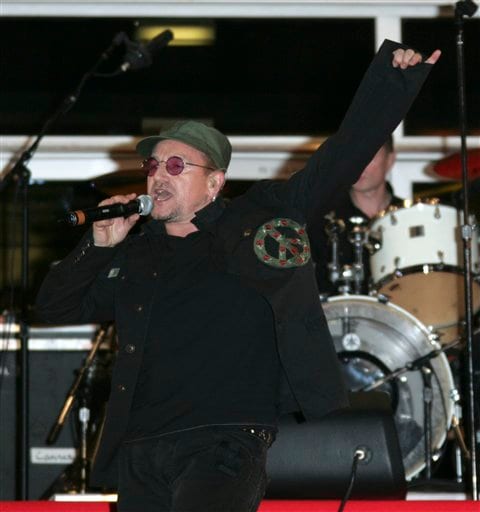 Irish musician Bono of U2 performs before the screening of the film U2 3D, at the 60th International film festival in Cannes.