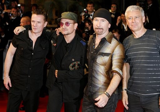 U2 members, from left, Larry Mullen Jr, Bono, The Edge and Adam Clayton arrive for the screening of U2 3D, at the 60th International film festival in Cannes.