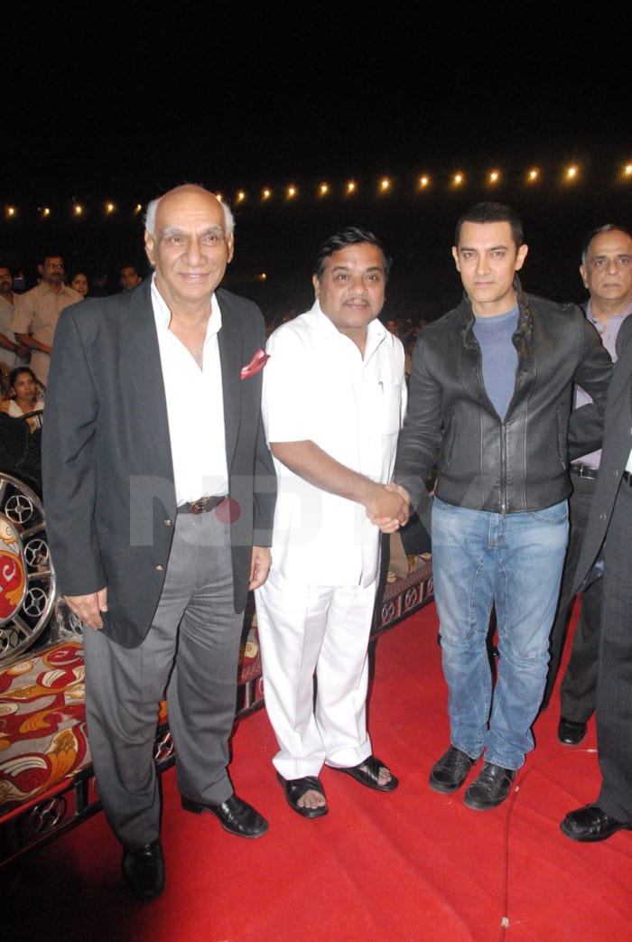 Aamir Khan walked in with Nationalist Congress Party leader RR Patil and director Yash Chopra.