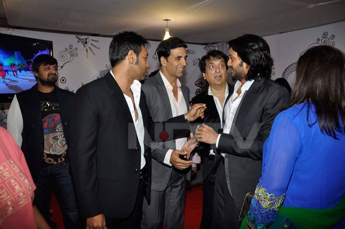 Sajid Nadiadwala gives Ajay, Akshay and Riteish the evil eye.