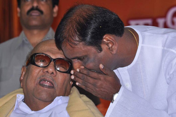 Chief Minister M Karunanidhi has a word with lyricist Vairamuthu.