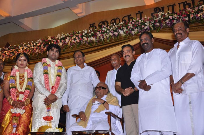 Posing for the cameras are the newly-married couple Kabilan and M. Ramya with the Union Home Minister P. Chidambaram, Chief Minister of Tamil Nadu M Karunanidhi, superstar Kamal Hasan, lyricist Vairamuthu and superstar Rajinikanth.