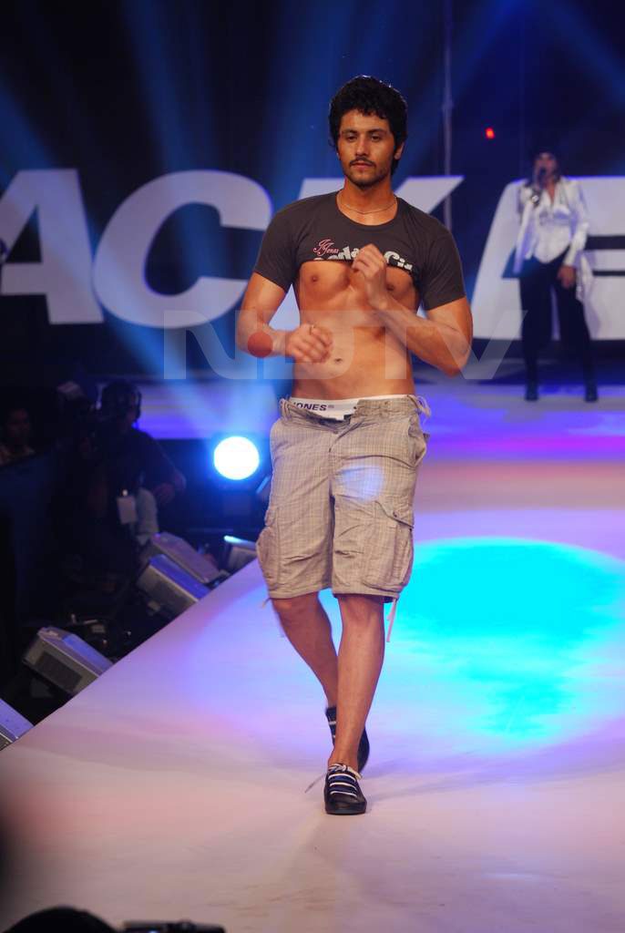 A model walks the ramp.