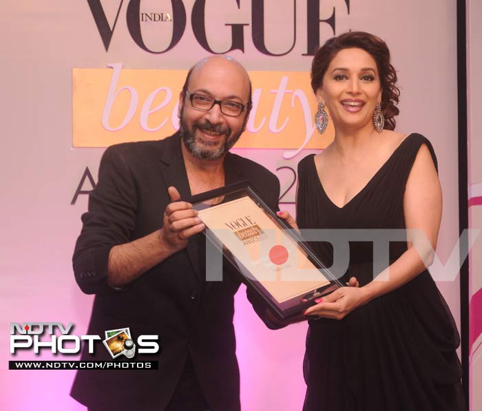 Haute black for Madhuri, naughty satin for Anushka at Vogue Awards