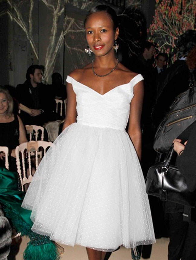 <b>Neo Classicist</b> - Fashion writer Shala Monroque is runway ready in this white at the 2011 Valentino Spring show