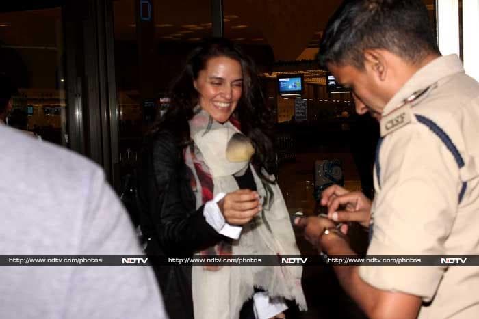 <I>Action Replayy</i> actress Neha Dhupia was also spotted at the airport.